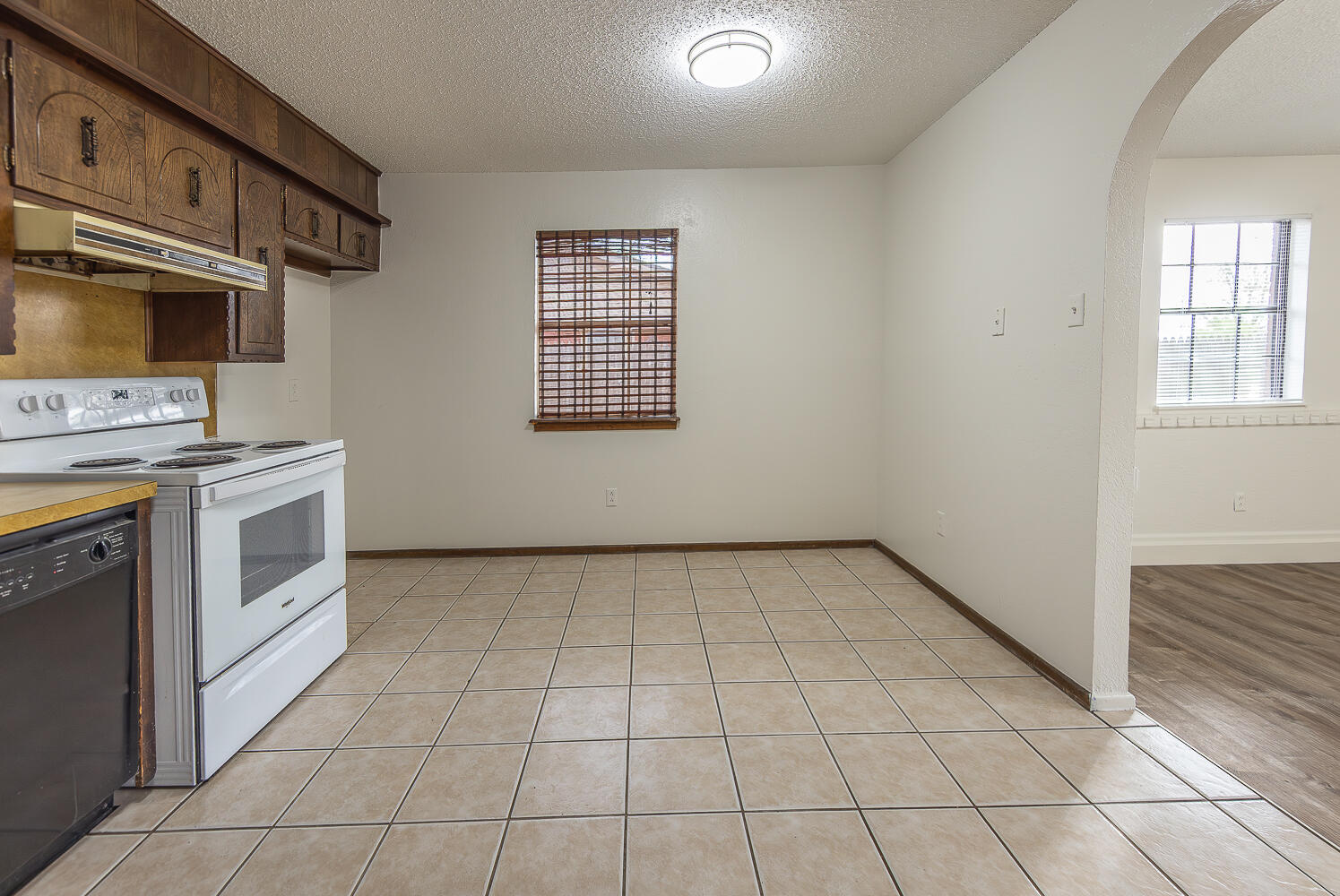 6305 35th Street Lubbock, TX 79407 - Photo 8 of 20 a view of a kitchen with washer and dryer
