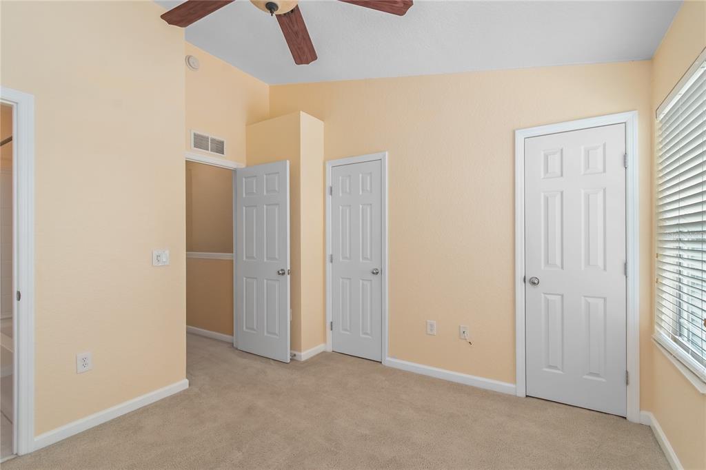 4814 Southwest 44th Circle Ocala, FL 34474 - Photo 19 of 40 an empty room with ceiling fan and window