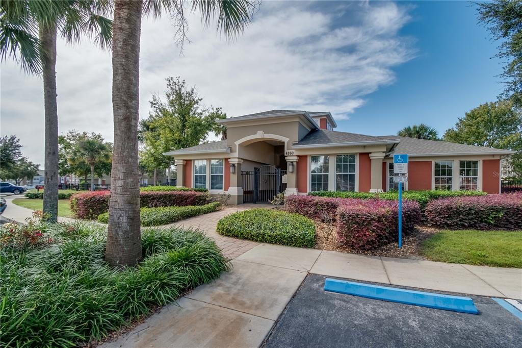 4814 Southwest 44th Circle Ocala, FL 34474 - Photo 33 of 40 a front view of a house with a garden and plants