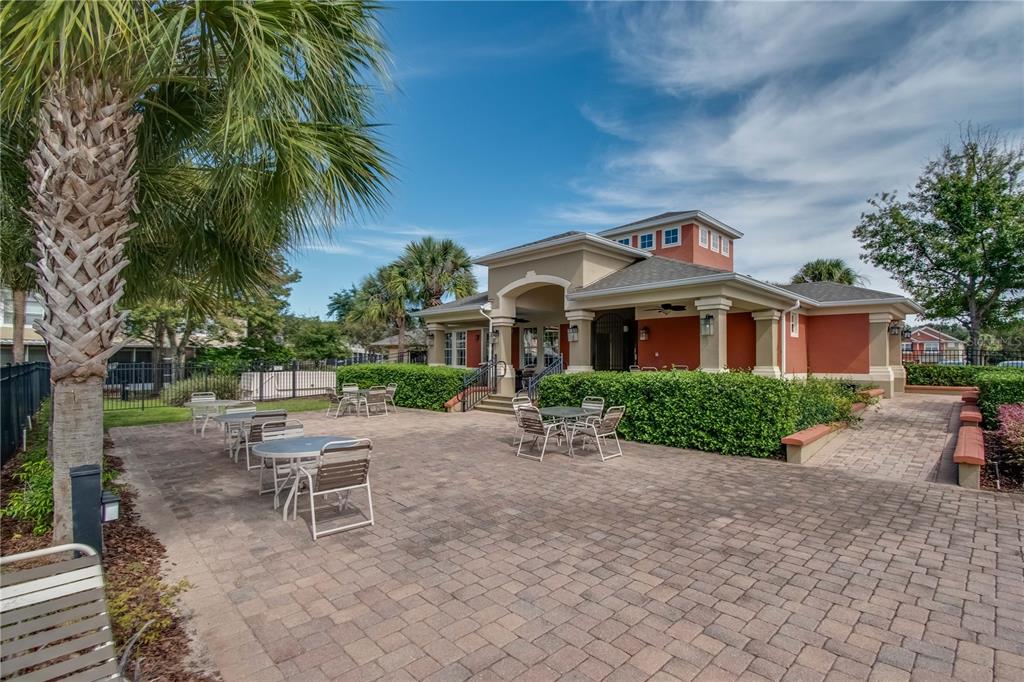 4814 Southwest 44th Circle Ocala, FL 34474 - Photo 36 of 40 a front view of a house with a garden