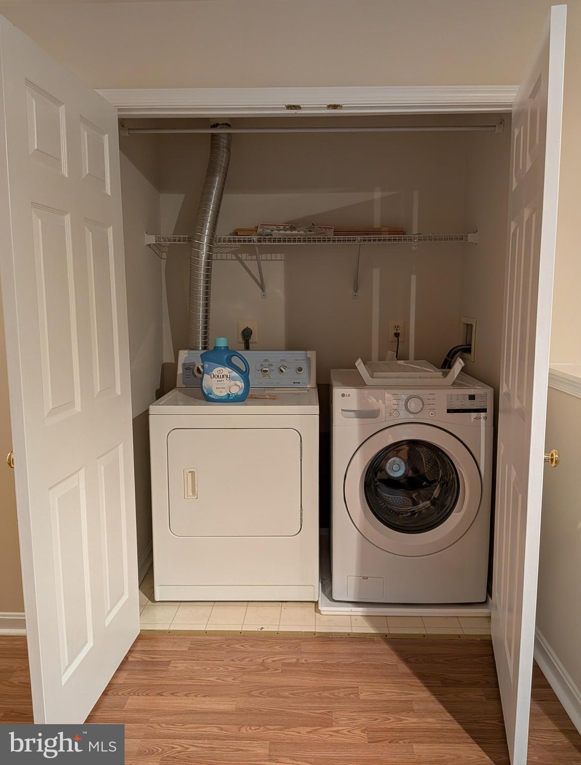 109 Timberbrook Lane, Unit 301 Gaithersburg, MD 20878 - Photo 18 of 22 a utility room with dryer and washer