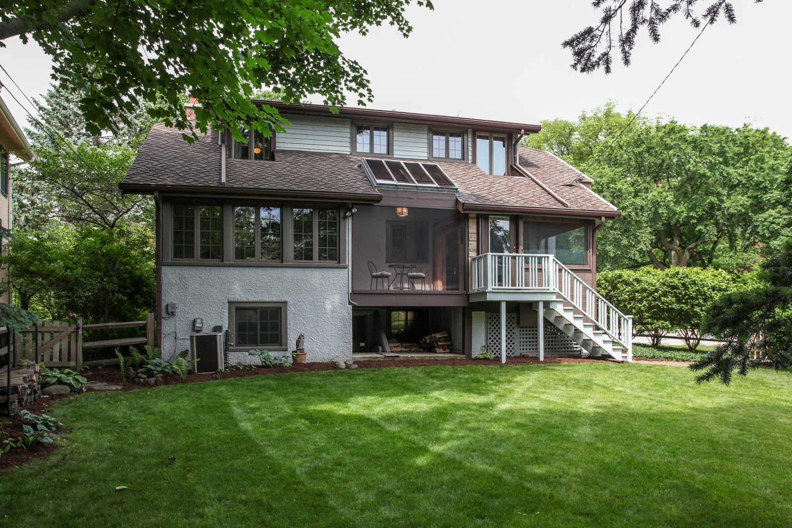 2629 Ridge Avenue Evanston, IL 60201 - Photo 21 of 25 a front view of a house with a yard table and chairs