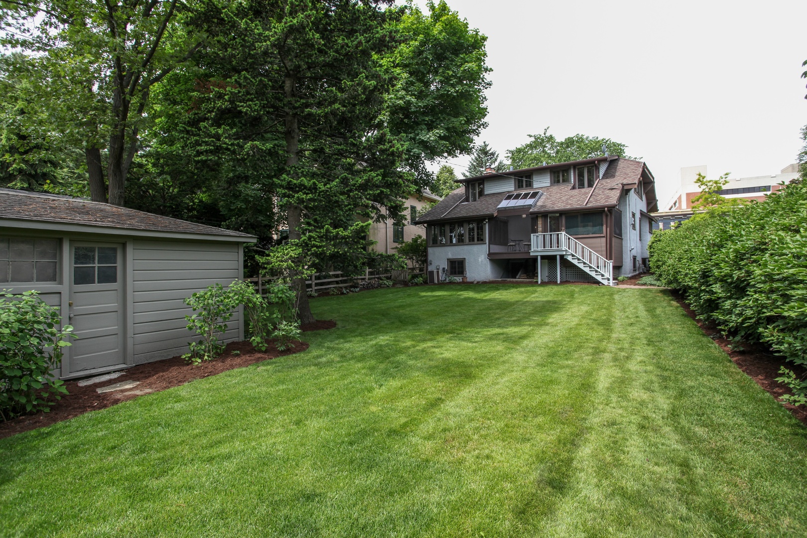 2629 Ridge Avenue Evanston, IL 60201 - Photo 22 of 25 a view of a house with a yard and sitting area