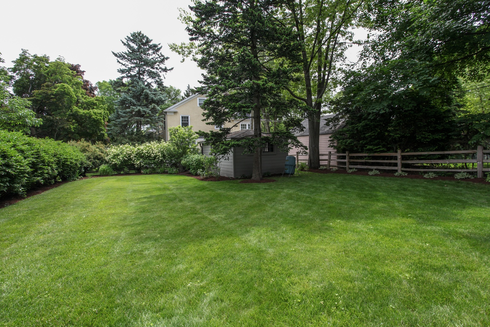 2629 Ridge Avenue Evanston, IL 60201 - Photo 24 of 25 a view of a garden with a bench
