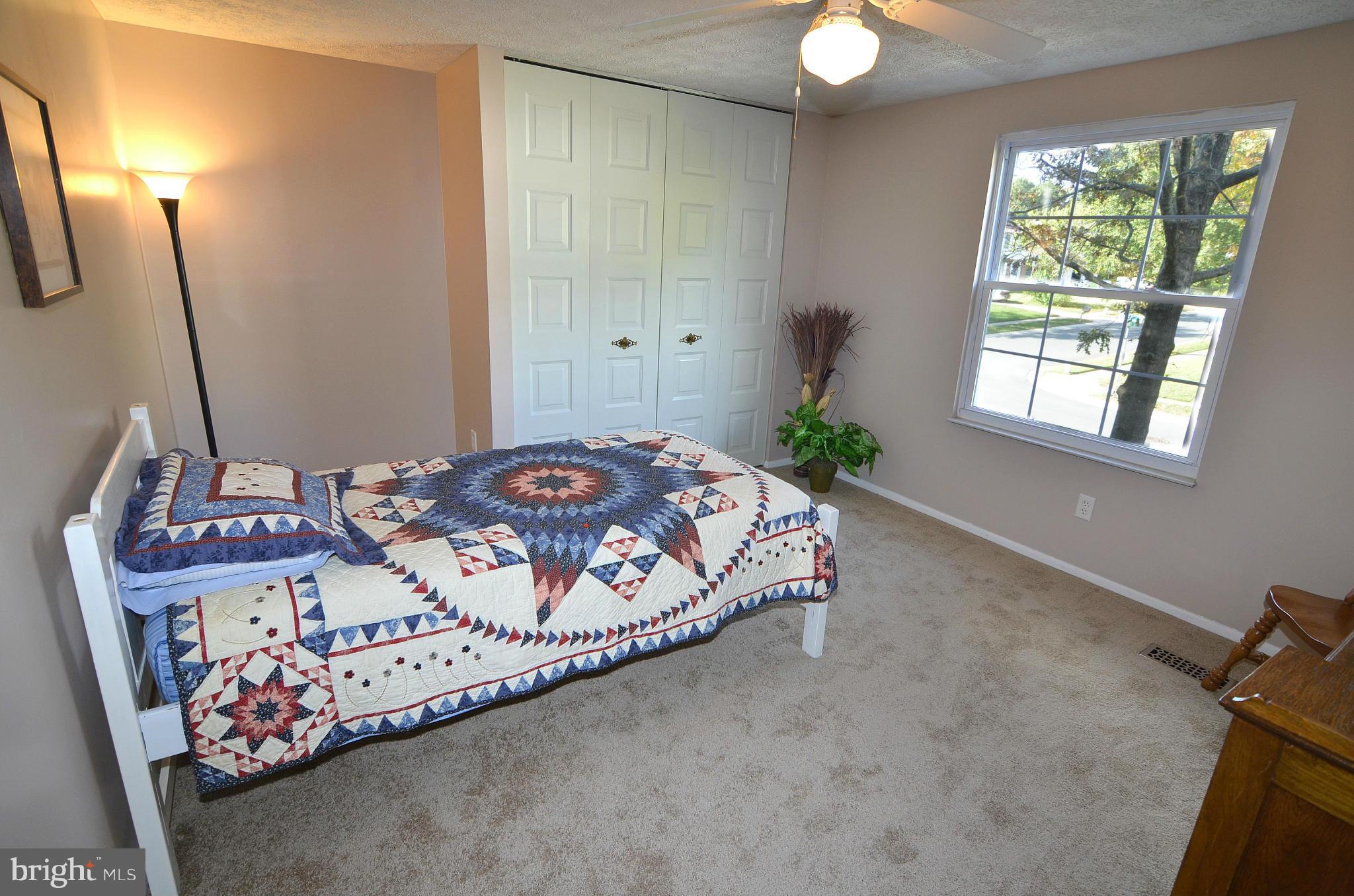 1503 Strider Court Hanover, MD 21076 - Photo 19 of 30 a bedroom with bed and a window