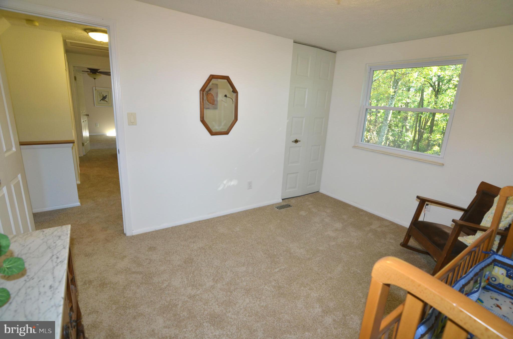 1503 Strider Court Hanover, MD 21076 - Photo 21 of 30 a view of a livingroom with furniture and a window