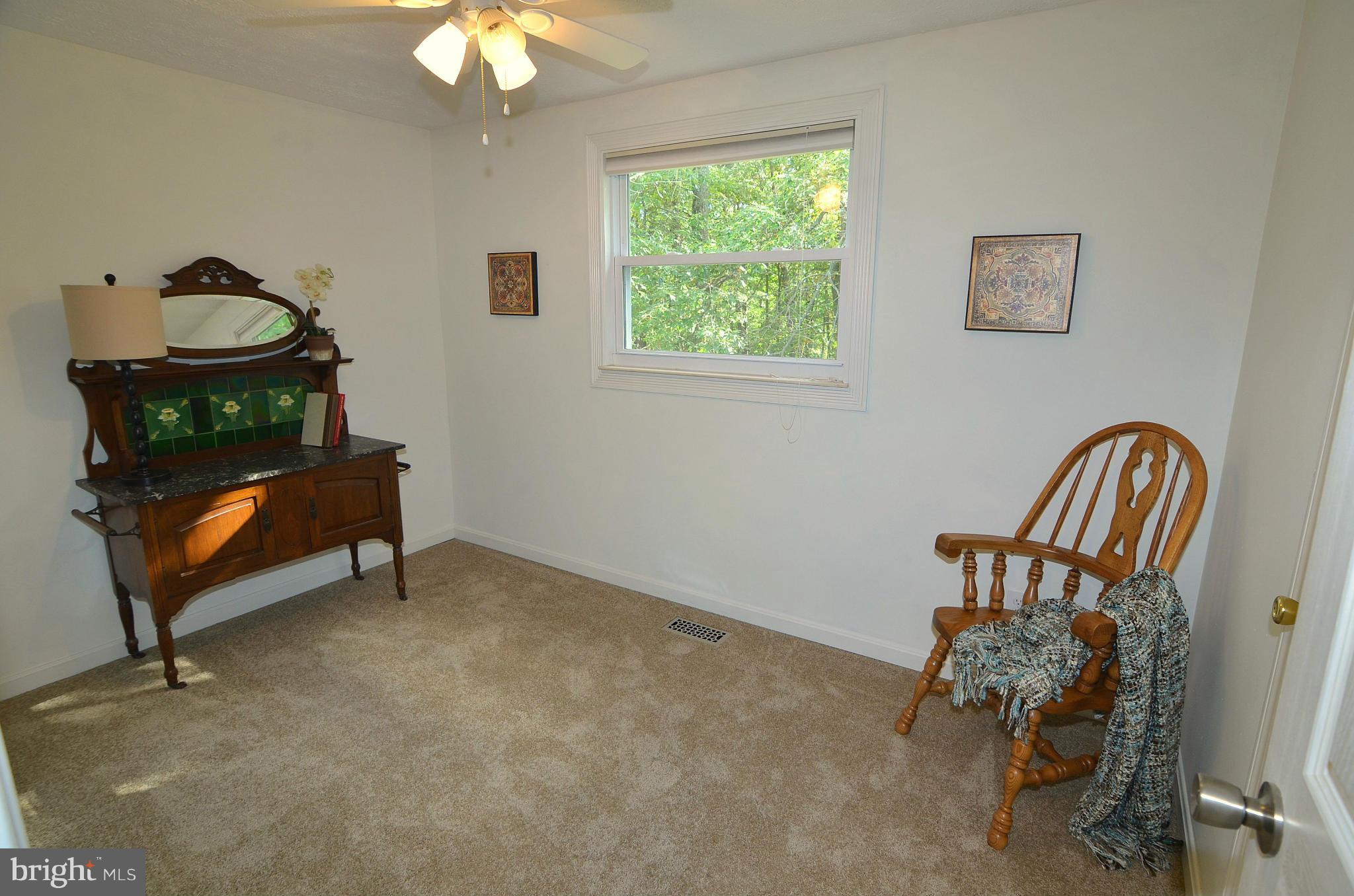 1503 Strider Court Hanover, MD 21076 - Photo 22 of 30 a room with furniture and a window