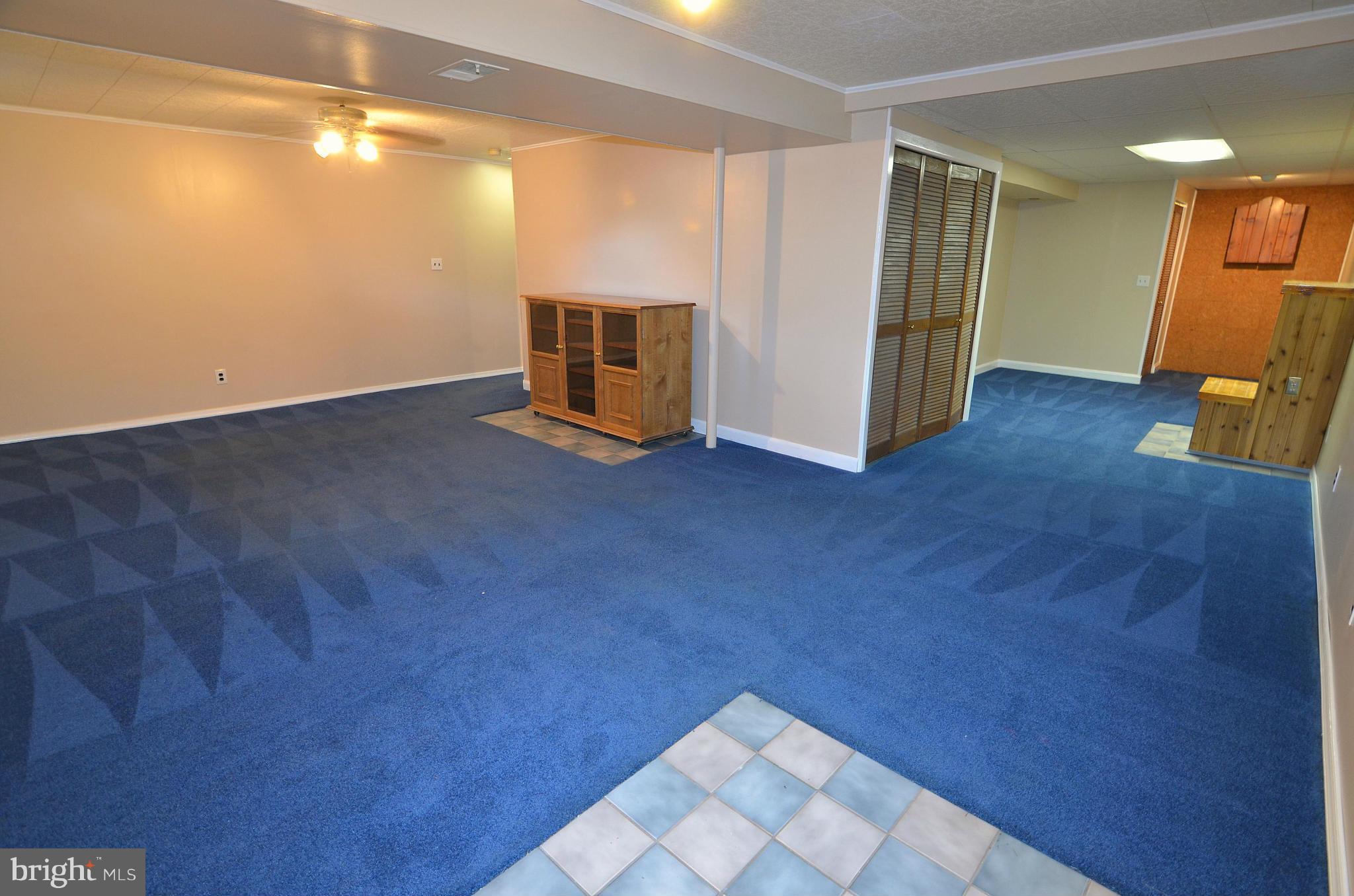 1503 Strider Court Hanover, MD 21076 - Photo 24 of 30 a view of empty room with wooden floor and fireplace