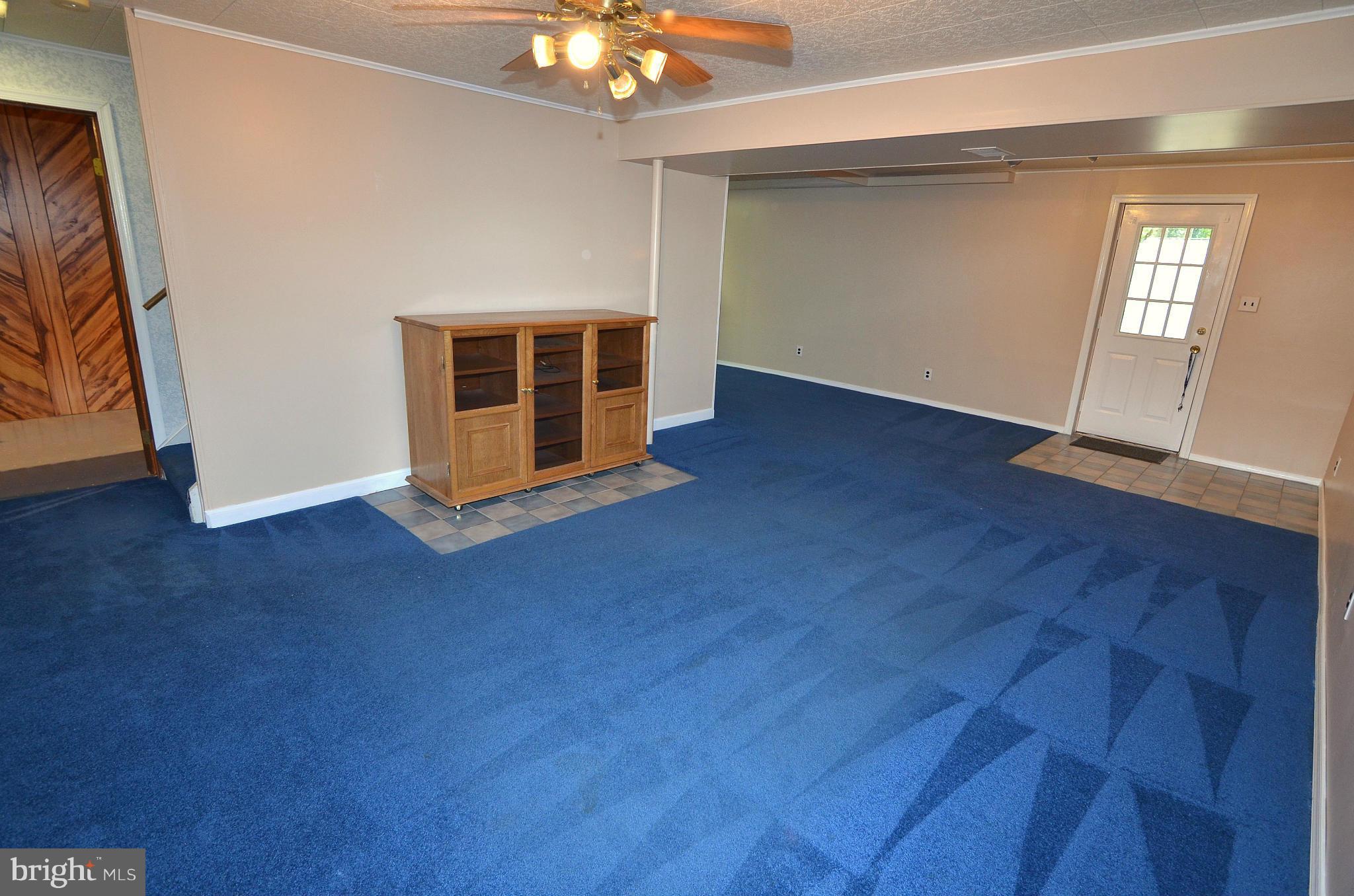 1503 Strider Court Hanover, MD 21076 - Photo 26 of 30 an empty room with wooden floor and windows
