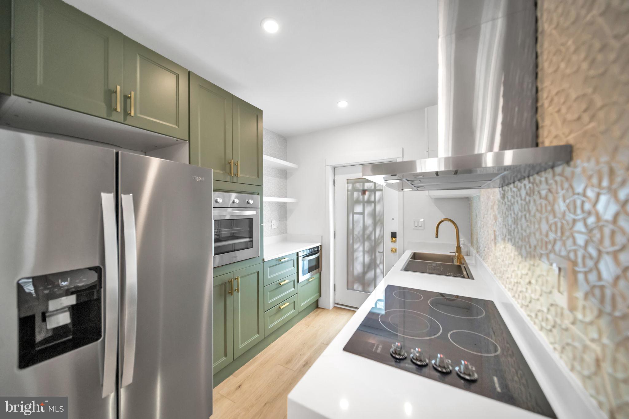 1845 Corcoran Street Northeast Washington, DC 20002 - Photo 11 of 33 Modern kitchen with stylish finishes.