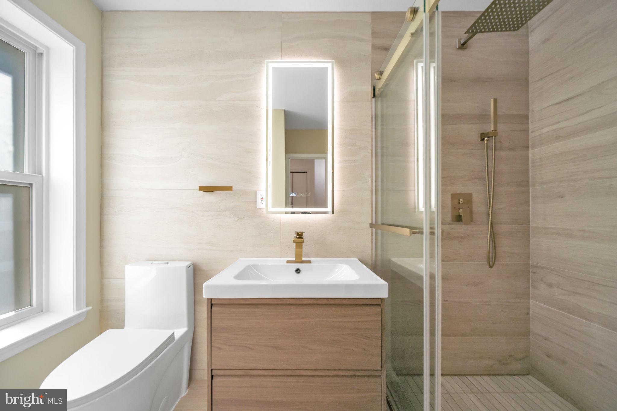 1845 Corcoran Street Northeast Washington, DC 20002 - Photo 20 of 33 Sleek modern bathroom oasis.