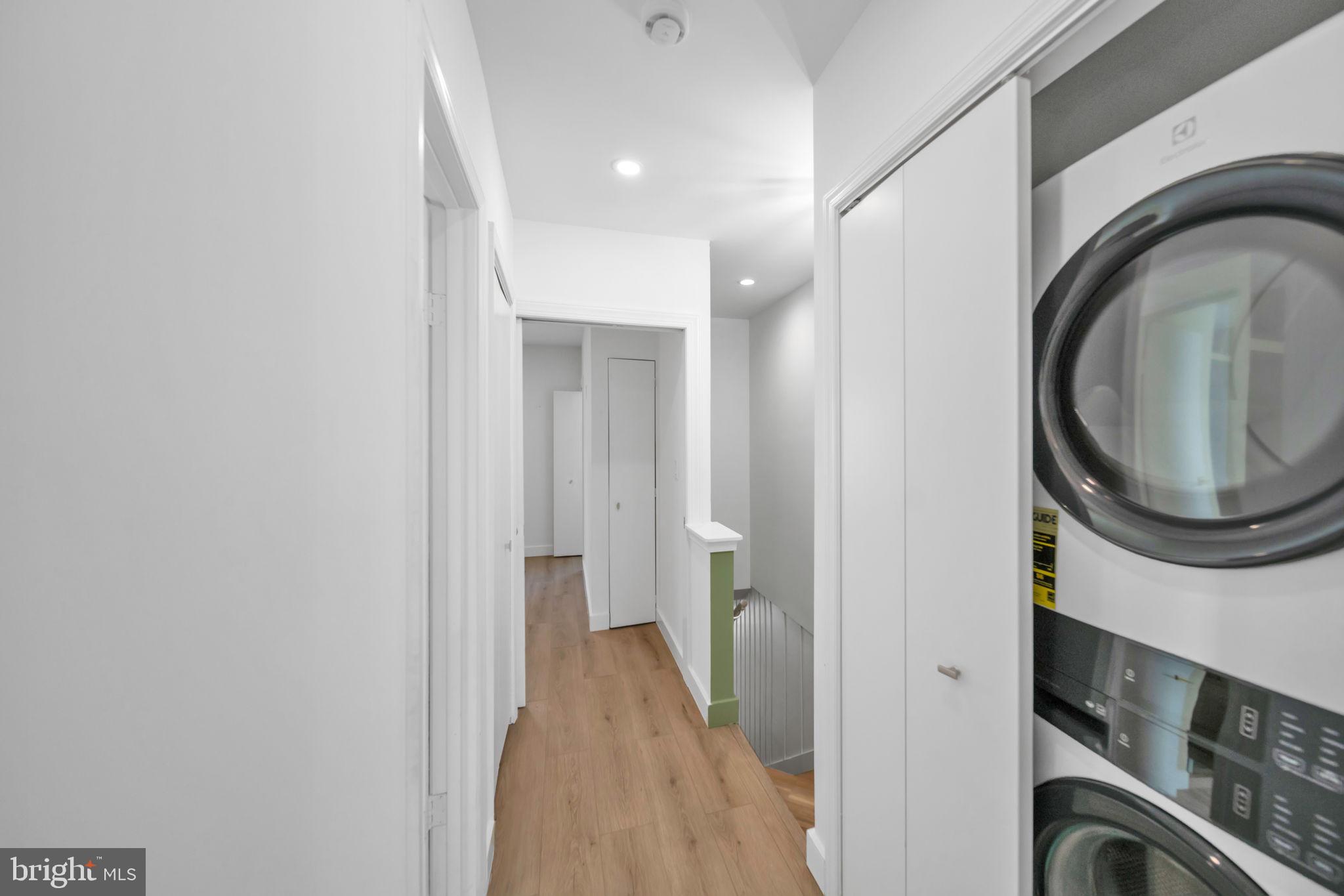 1845 Corcoran Street Northeast Washington, DC 20002 - Photo 22 of 33 Modern hallway with laundry amenities.