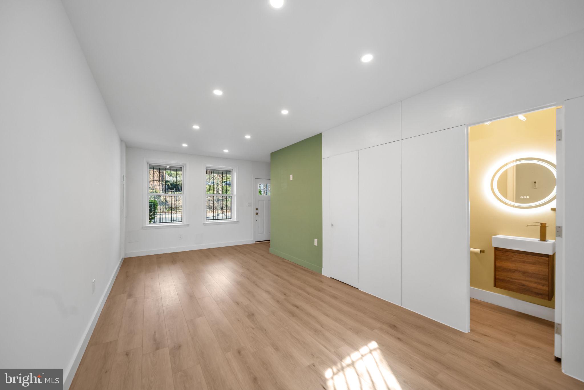 1845 Corcoran Street Northeast Washington, DC 20002 - Photo 8 of 33 Bright and airy modern living space.