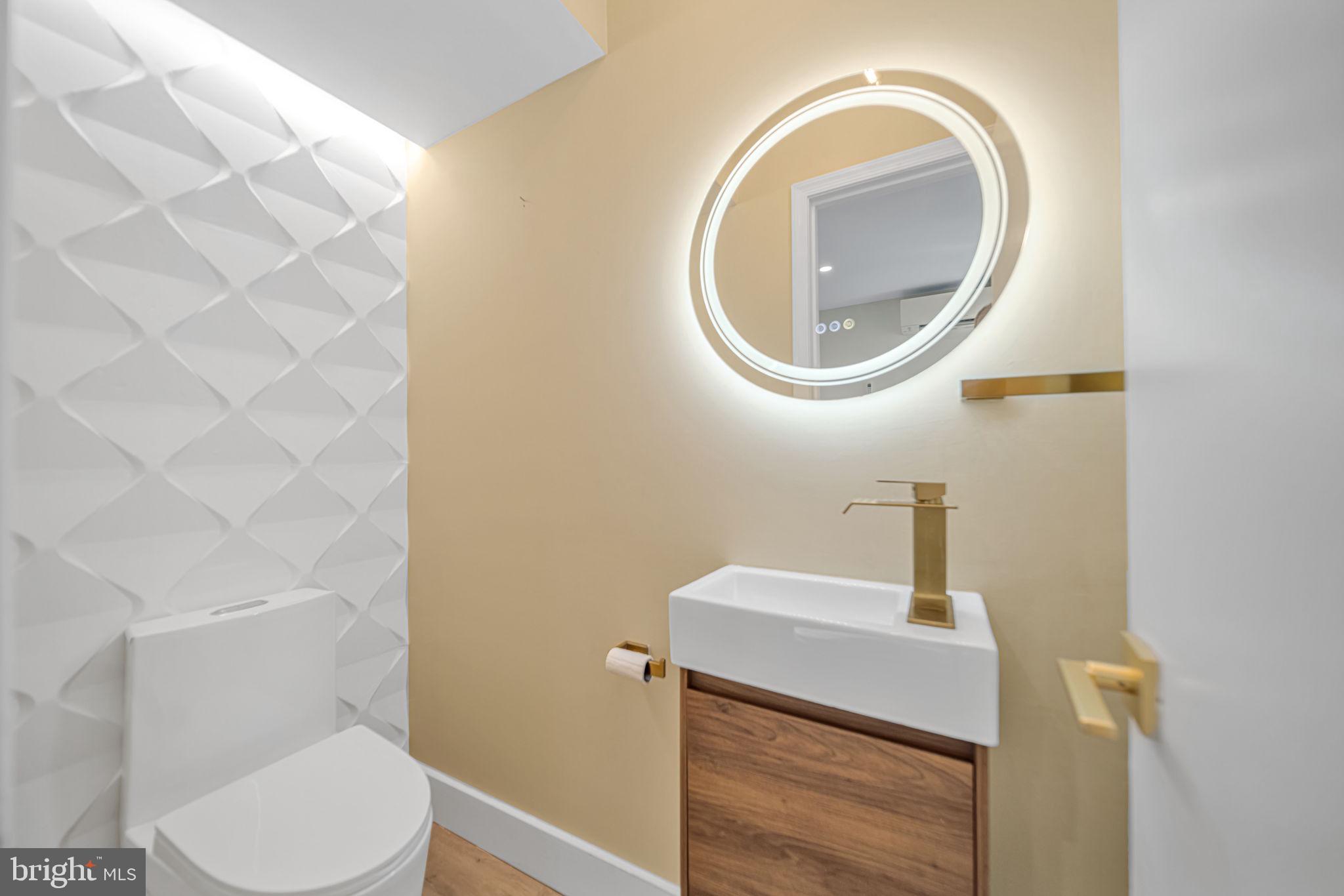 1845 Corcoran Street Northeast Washington, DC 20002 - Photo 9 of 33 Sleek modern bathroom with elegant accents.