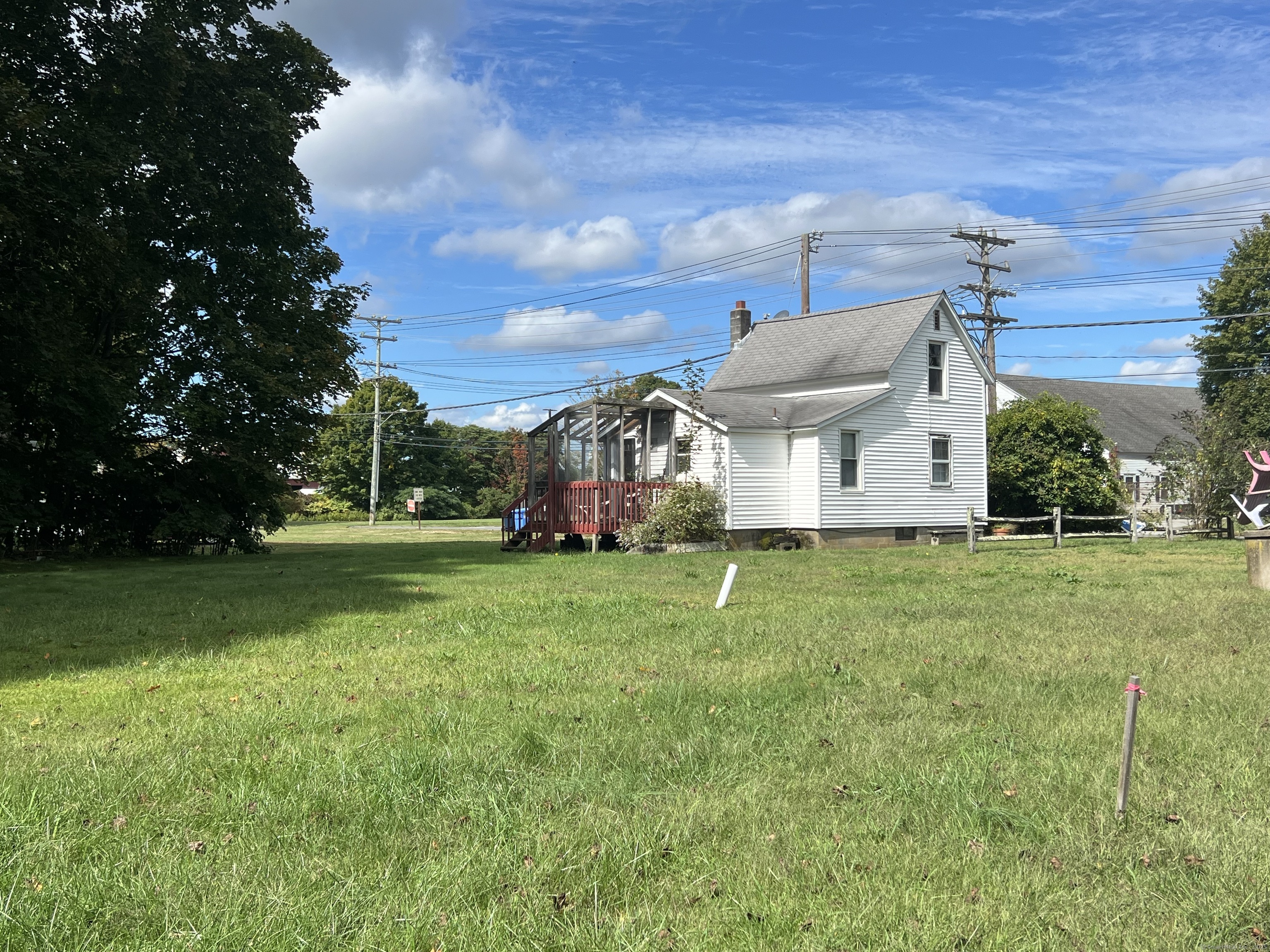 41 Trolley Road Westbrook, CT 06498 - Photo 6 of 6 a front view of a house with garden