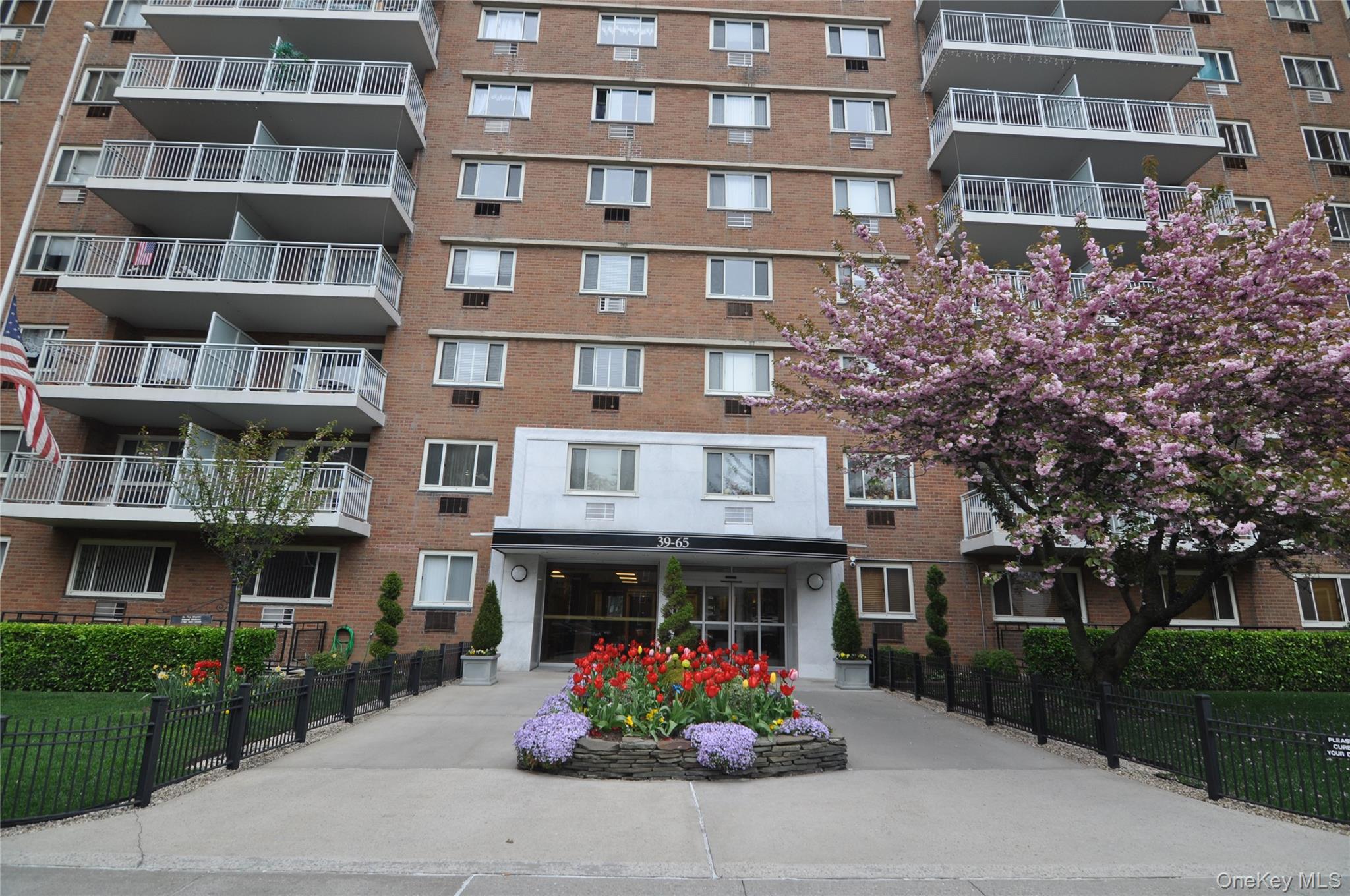 39-65 52nd Street, Unit 2H Queens, NY 11377 - Photo 12 of 18 a front view of multi story residential apartment building