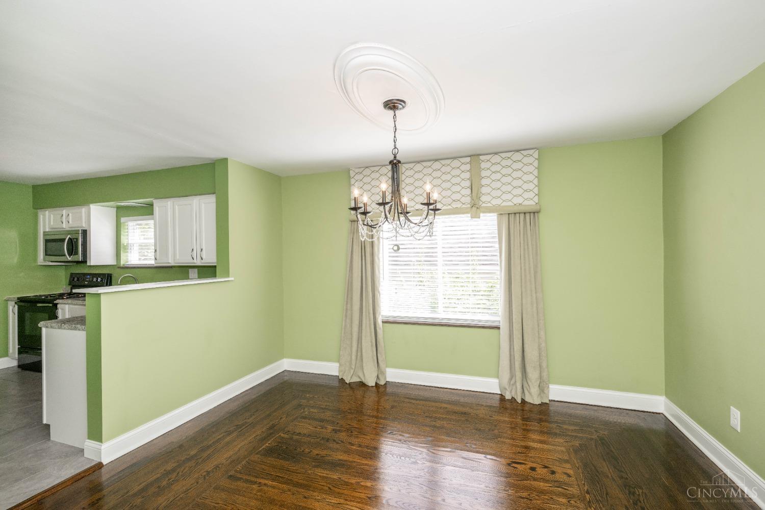 7396 Dawson Road Madeira, OH 45243 - Photo 9 of 42 The beautiful original hardwood floors carry through to the Dining Room and Bedrooms!
