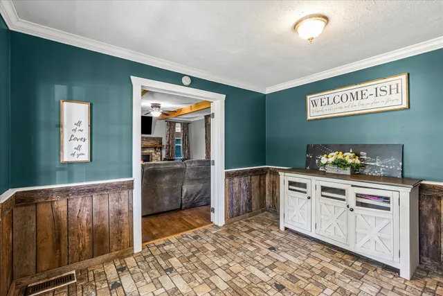 a kitchen with stainless steel appliances granite countertop a refrigerator and a stove