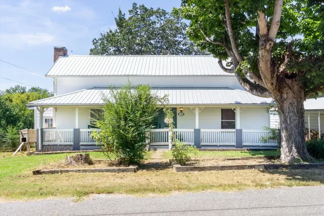 a view of a house with a swimming pool