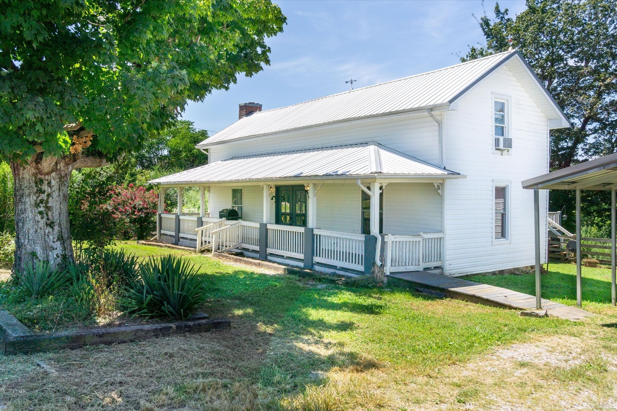 519 John McCoin Road Sparta, TN 38583 - Photo 5 of 27 a view of a house with backyard and porch