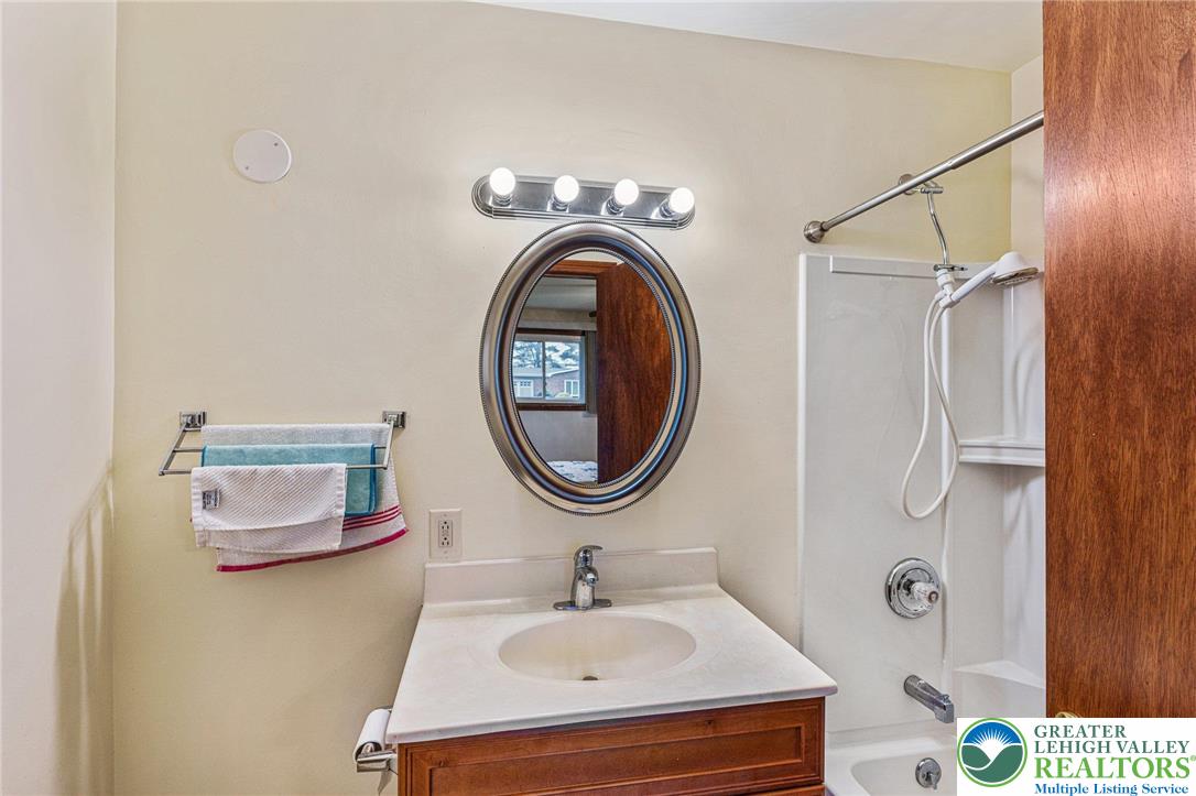 194 Gallagher Road Whitehall, PA 18052 - Photo 12 of 21 a bathroom with a sink and a mirror