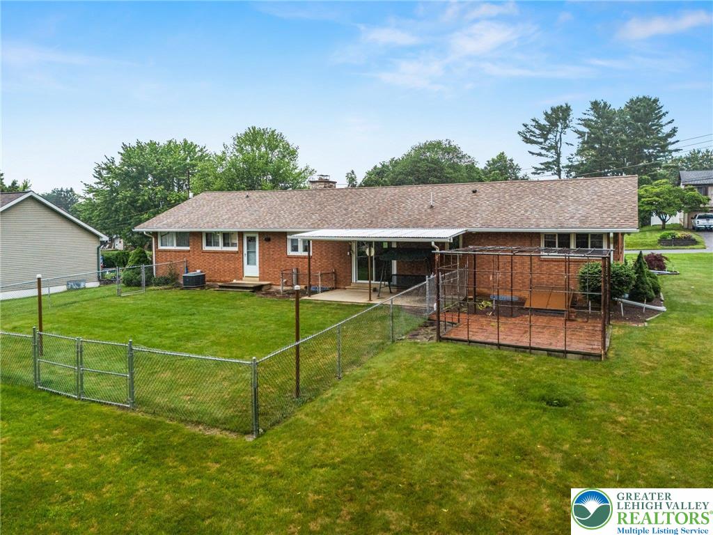 194 Gallagher Road Whitehall, PA 18052 - Photo 20 of 21 a view of a house with a yard and sitting area
