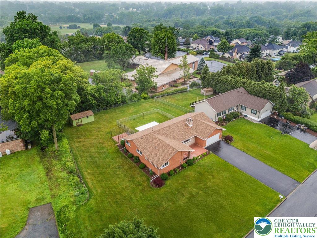 194 Gallagher Road Whitehall, PA 18052 - Photo 3 of 21 an aerial view of residential houses with outdoor space and trees
