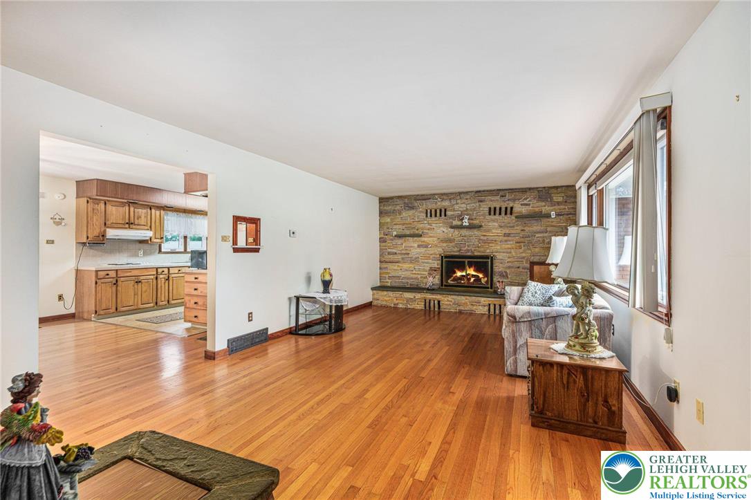 194 Gallagher Road Whitehall, PA 18052 - Photo 5 of 21 a living room with furniture and a fireplace