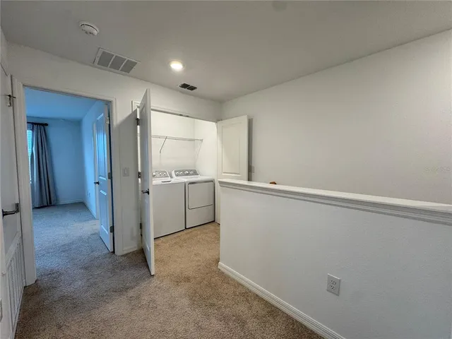 a view of a kitchen with a sink