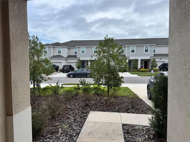 a view of storage and utility room with racks on the wall