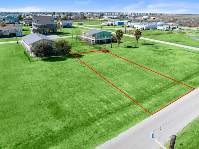 a view of a garden with houses