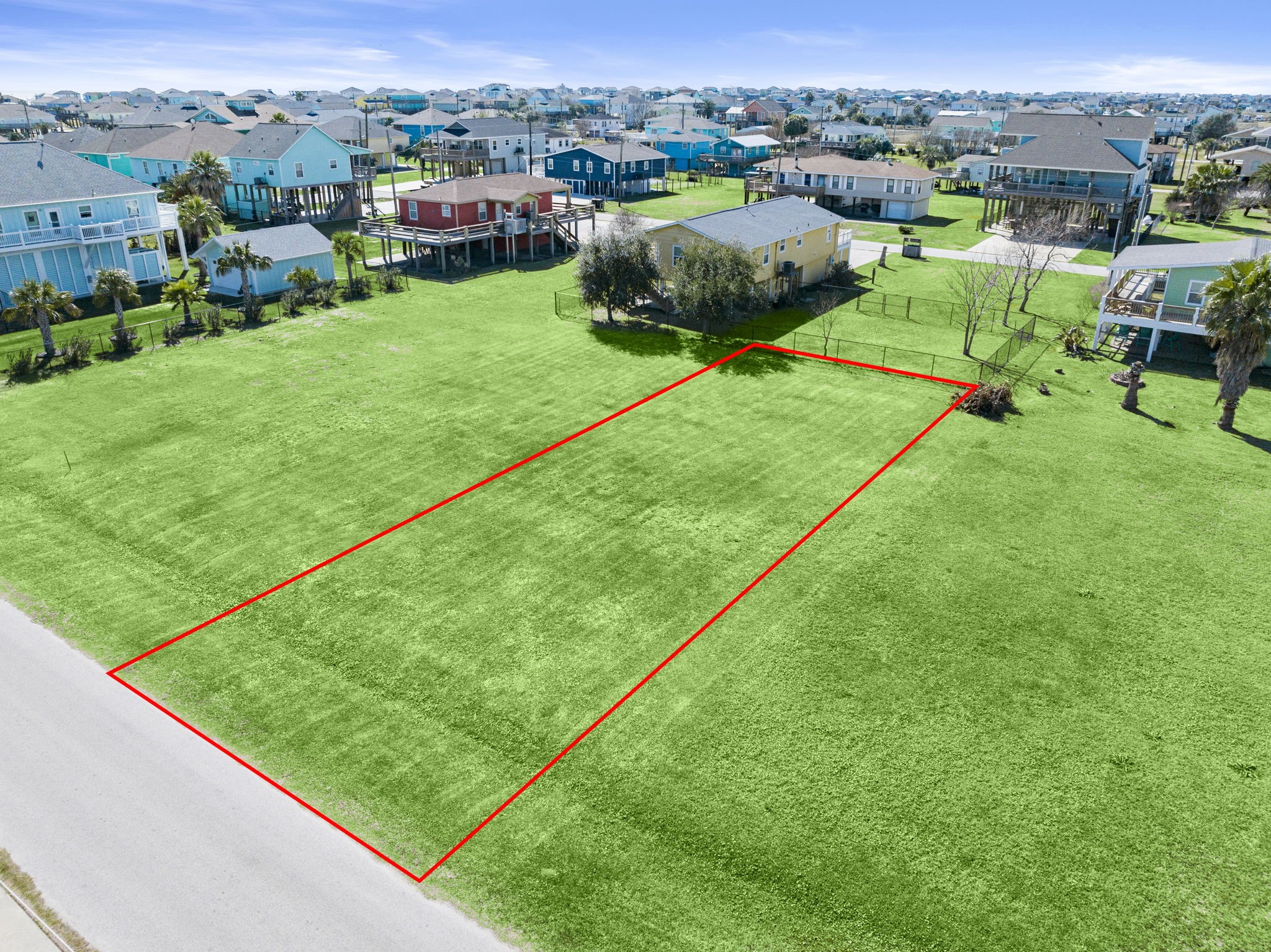 979 Wommack Crystal Beach, TX 77650 - Photo 13 of 16 a view of a garden with houses