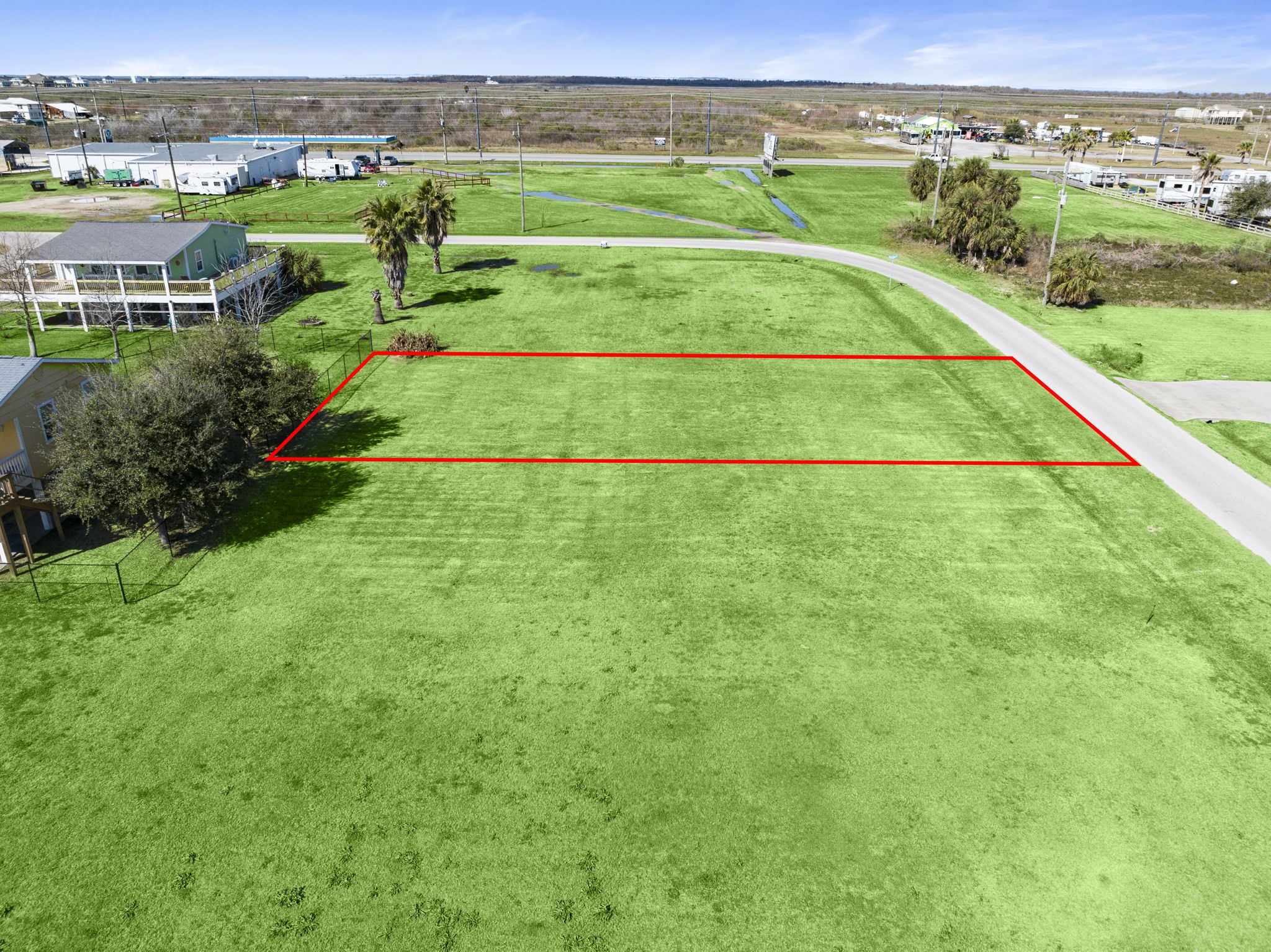 979 Wommack Crystal Beach, TX 77650 - Photo 10 of 16 an aerial view of residential houses with outdoor space and street view