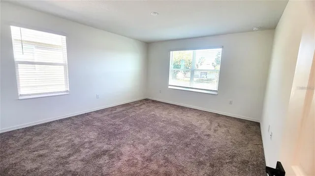 an empty room with a window