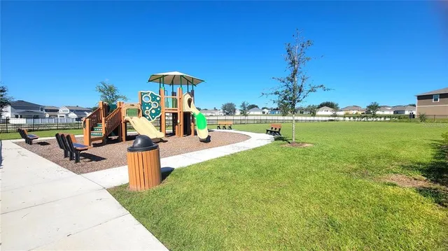 a view of a park with swings