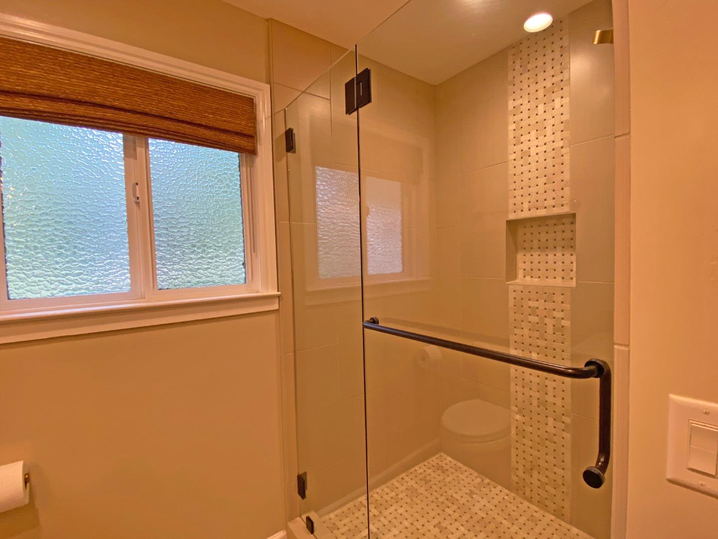 7 Vía Del Sol Watsonville, CA 95076 - Photo 11 of 21 a bathroom with a shower and a window