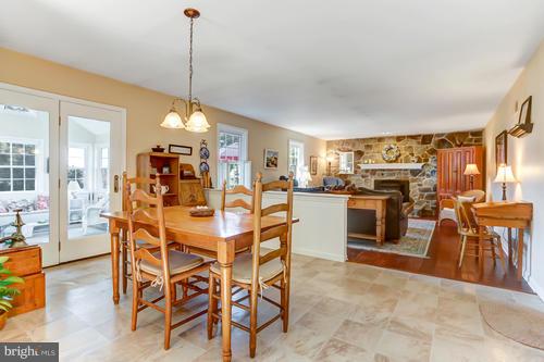 854 Furnace Hills Pike Lititz, PA 17543 - Photo 11 of 50 Breakfast area out to sunroom & into family room