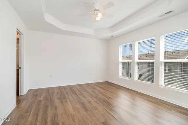 a kitchen with stainless steel appliances granite countertop a sink stove and microwave