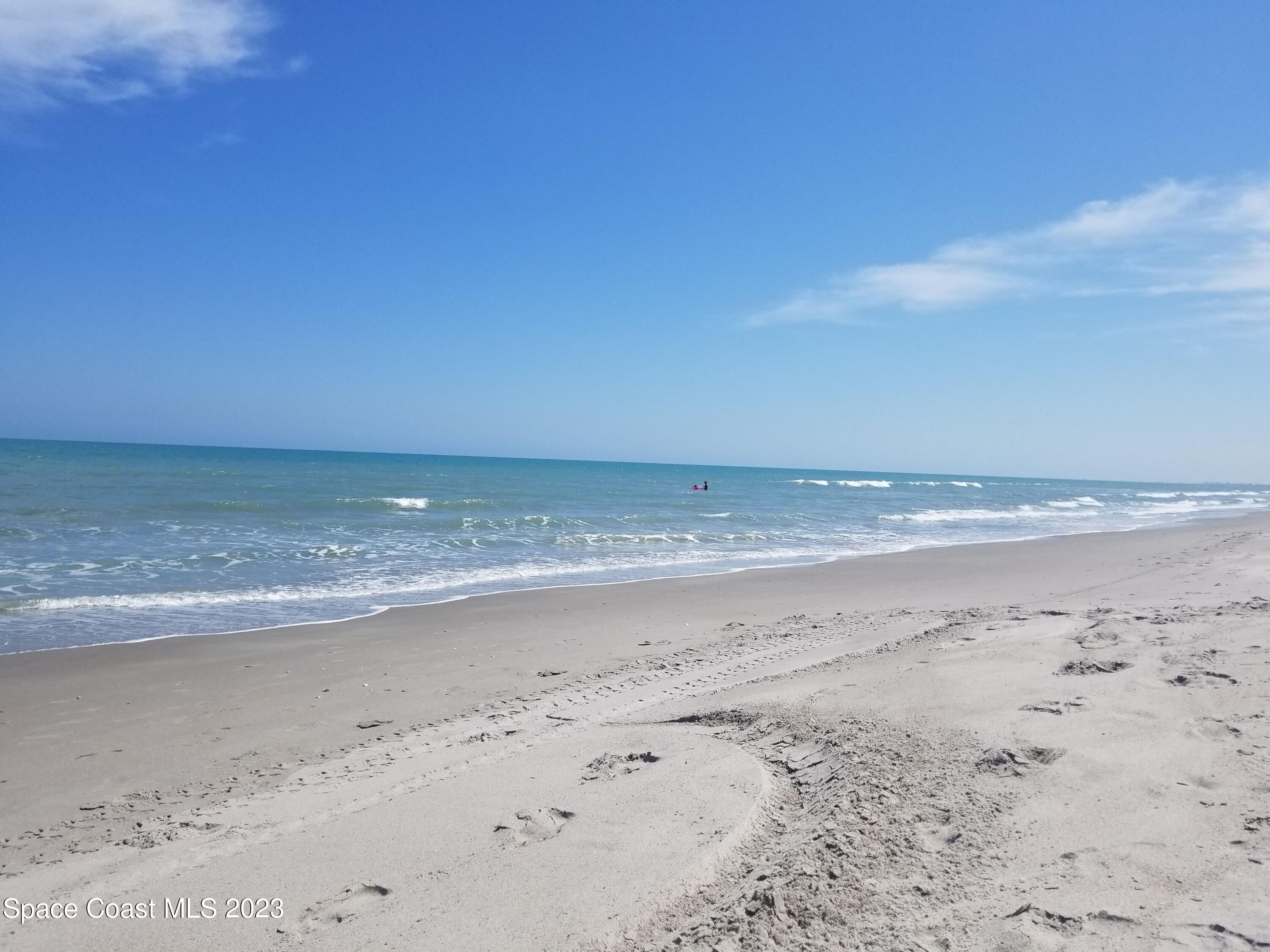 404 Tyler Avenue, Unit 14 Cape Canaveral, FL 32920 - Photo 16 of 29 a view of beach and ocean
