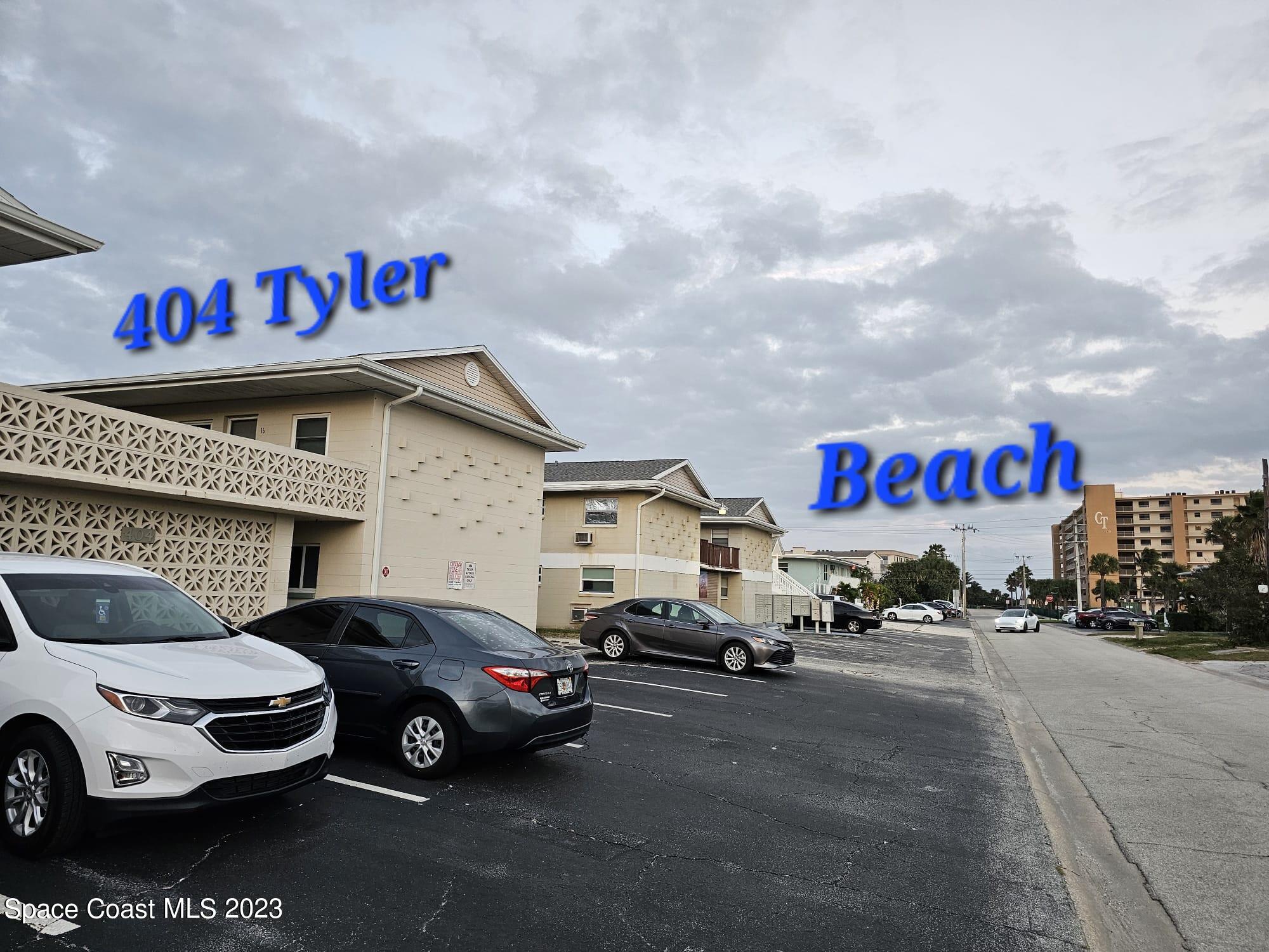 404 Tyler Avenue, Unit 14 Cape Canaveral, FL 32920 - Photo 2 of 29 a view of parking