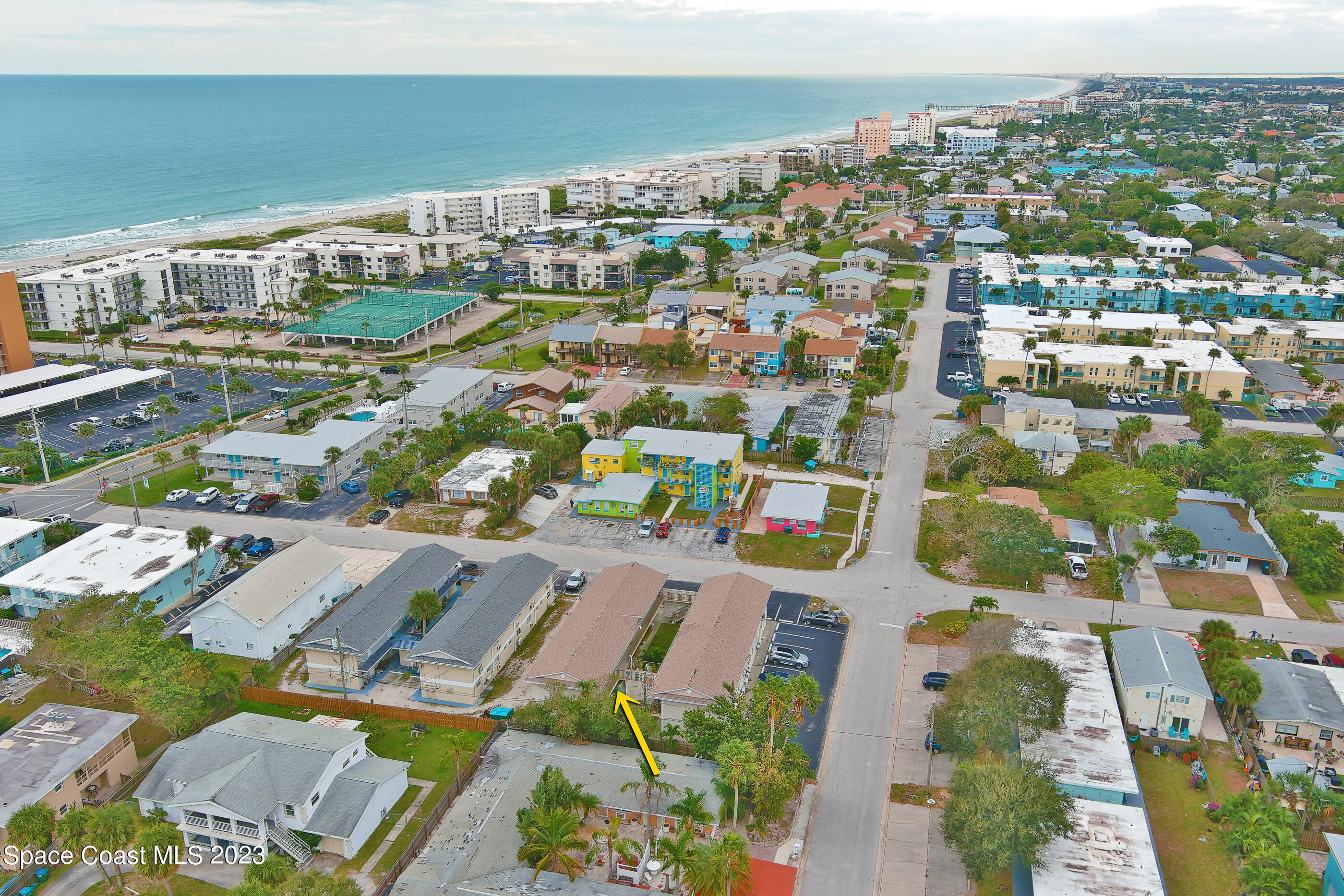 404 Tyler Avenue, Unit 14 Cape Canaveral, FL 32920 - Photo 27 of 29 an aerial view of a city with lots of residential buildings