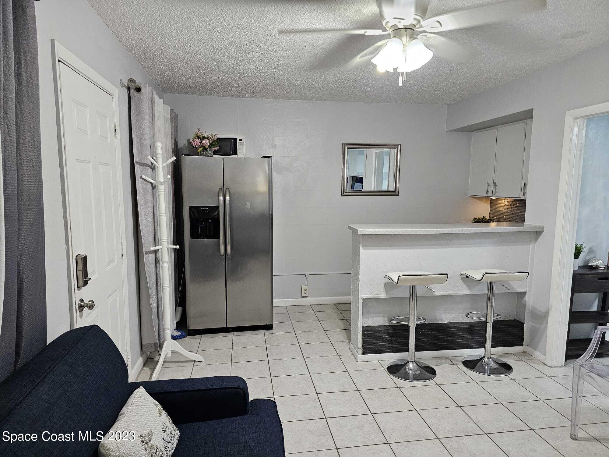 404 Tyler Avenue, Unit 14 Cape Canaveral, FL 32920 - Photo 6 of 29 IMG-20231213-WA0005