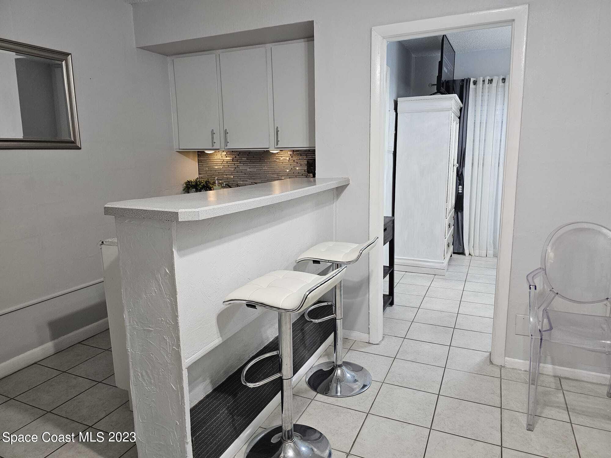 404 Tyler Avenue, Unit 14 Cape Canaveral, FL 32920 - Photo 7 of 29 IMG-20231213-WA0014