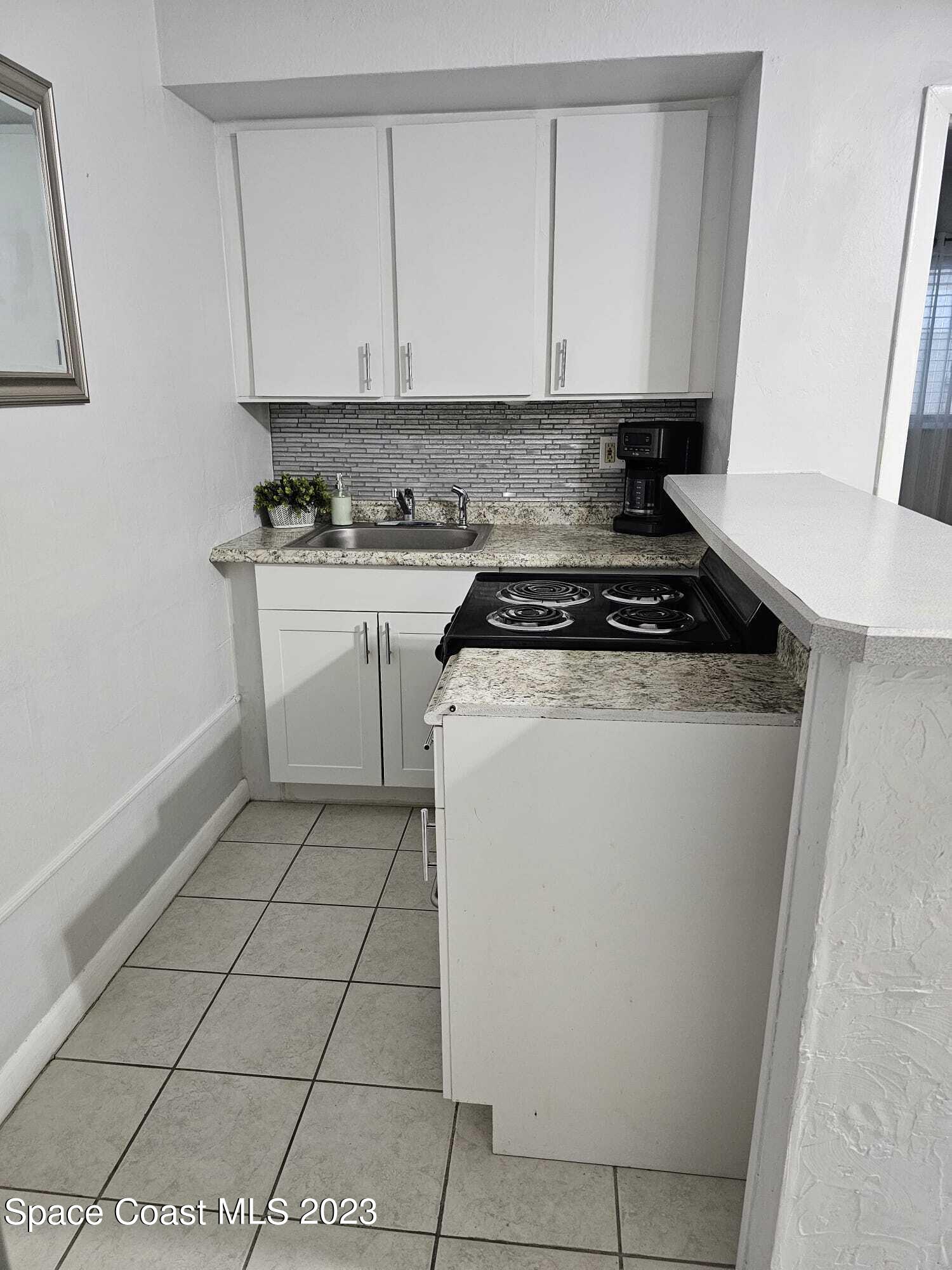 404 Tyler Avenue, Unit 14 Cape Canaveral, FL 32920 - Photo 8 of 29 IMG-20231213-WA0002