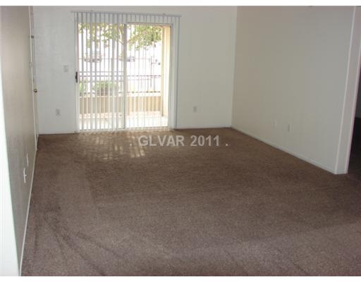 7885 West Flamingo Road, Unit 1117 Las Vegas, NV 89147 - Photo 3 of 9 Living Room.