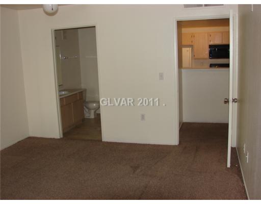 7885 West Flamingo Road, Unit 1117 Las Vegas, NV 89147 - Photo 8 of 9 Master Bedroom.