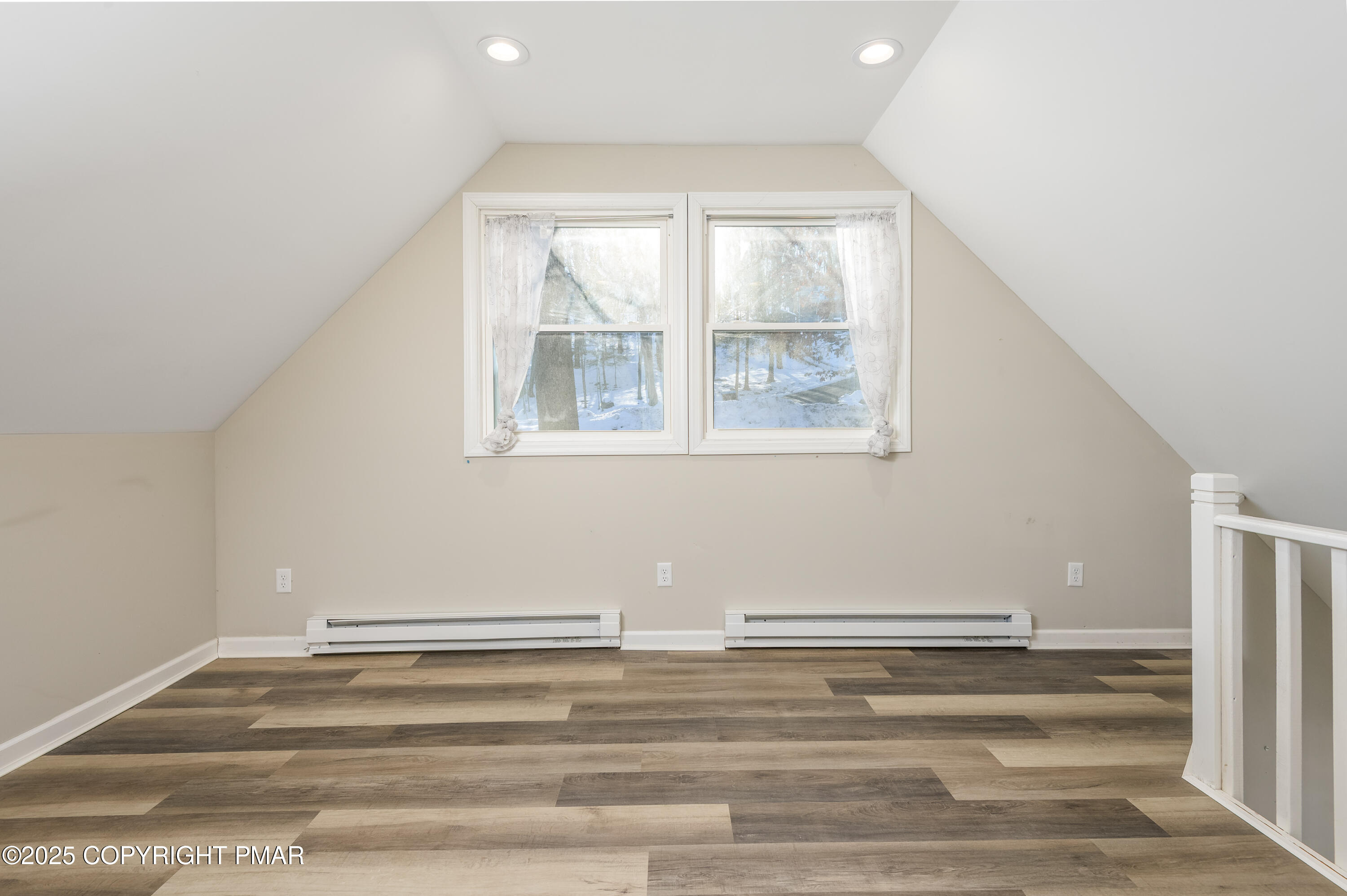 6151 Kansa Road East Stroudsburg, PA 18302 - Photo 22 of 26 a view of empty room with wooden floor and fan