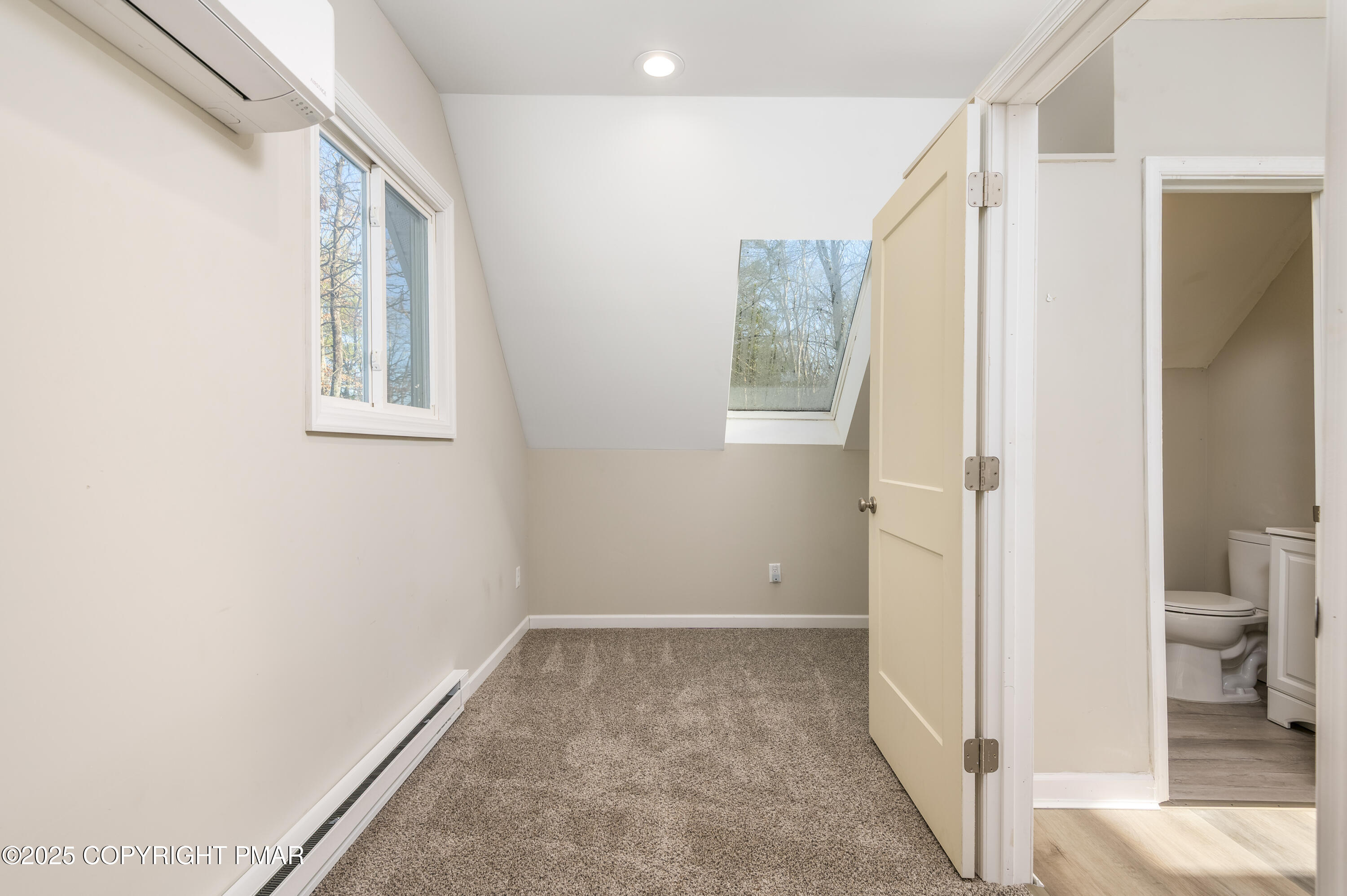 6151 Kansa Road East Stroudsburg, PA 18302 - Photo 25 of 26 a view of a hallway with wooden floor and a bathroom