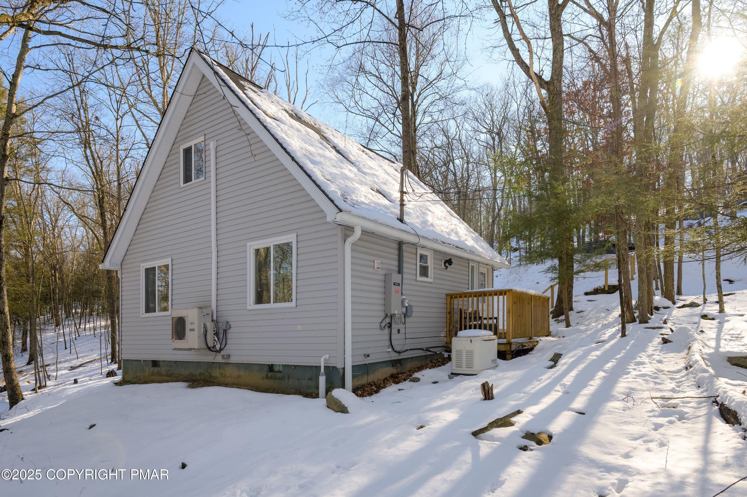 6151 Kansa Road East Stroudsburg, PA 18302 - Photo 5 of 26 a view of a house with a snow in the road