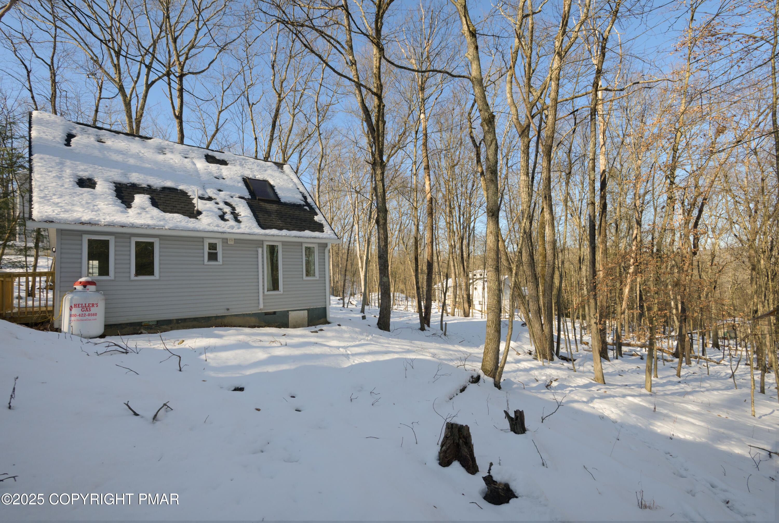 6151 Kansa Road East Stroudsburg, PA 18302 - Photo 9 of 26 a view of a house with a snow in the yard
